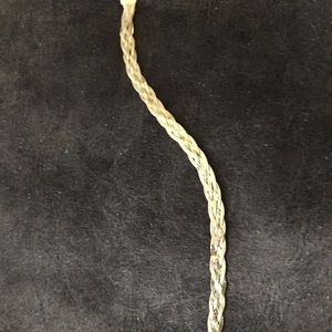 Gold braided bracelet. 7 inches